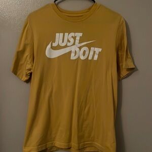 Men’s yellow Nike shirt